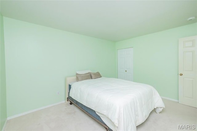 742 Arbor Ridge Ct, Ballwin, MO 63021 - bedroom featuring light carpet and a closet