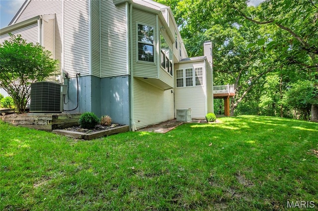 742 Arbor Ridge Ct, Ballwin, MO 63021 - view of home's exterior with a chimney and a yard