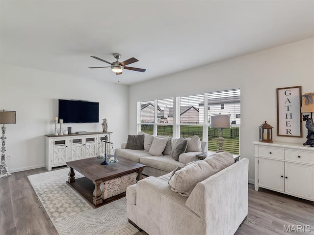 1673 Lake Meade Dr, Pacific, MO 63069 - living area featuring a ceiling fan and wood finished floors