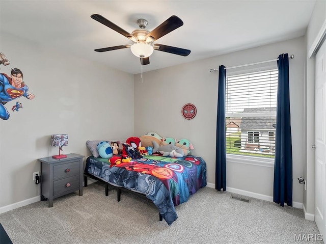 1673 Lake Meade Dr, Pacific, MO 63069 - bedroom with multiple windows, carpet floors, ceiling fan, and a closet