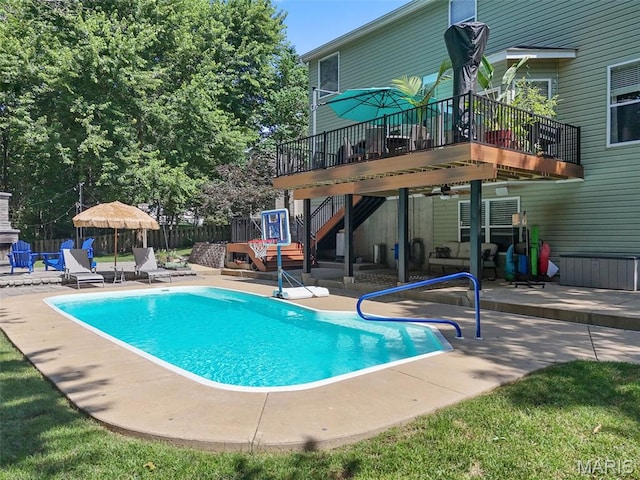 10 Renaud Pass, Ofallon, MO 63366 - view of pool with stairs, a patio, and a wooden deck