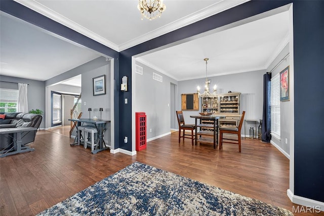 10 Renaud Pass, Ofallon, MO 63366 - dining room featuring a chandelier, wood finished floors, and crown molding