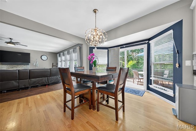 10 Renaud Pass, Ofallon, MO 63366 - dining area featuring healthy amount of natural light, light wood-style floors, a chandelier, and ceiling fan