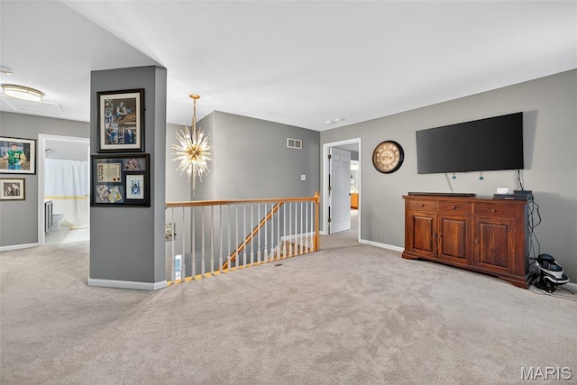 10 Renaud Pass, Ofallon, MO 63366 - unfurnished living room with carpet floors and baseboards