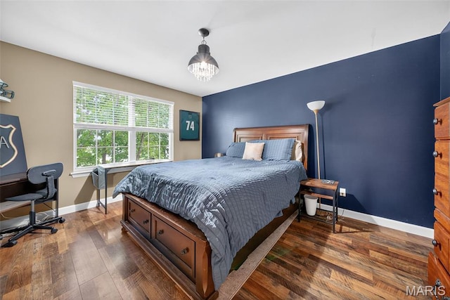 10 Renaud Pass, Ofallon, MO 63366 - bedroom featuring wood finished floors, a chandelier, and an office area