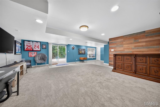 10 Renaud Pass, Ofallon, MO 63366 - carpeted living room with wood walls, recessed lighting, and an accent wall