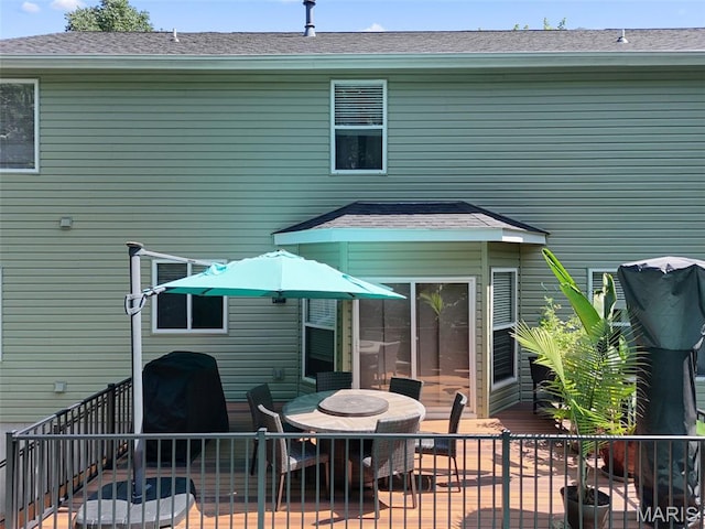 10 Renaud Pass, Ofallon, MO 63366 - rear view of house with outdoor dining area and a deck