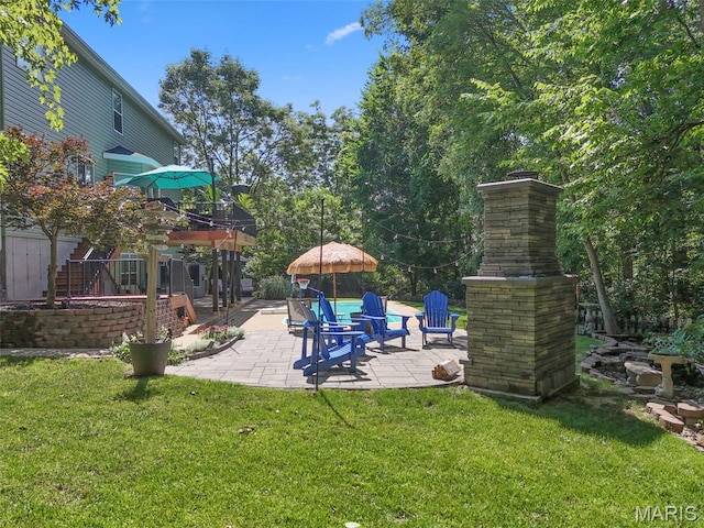 10 Renaud Pass, Ofallon, MO 63366 - view of green lawn with a patio area
