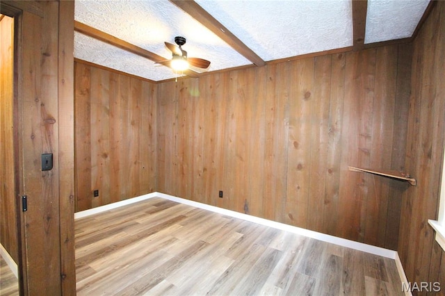 14525 Meadowlark Ln, Saint Genevieve, MO 63670 - unfurnished room with ceiling fan, wood walls, and wood finished floors