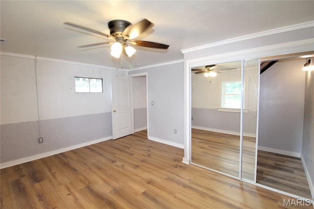 14525 Meadowlark Ln, Saint Genevieve, MO 63670 - unfurnished bedroom featuring crown molding, wood finished floors, and ceiling fan