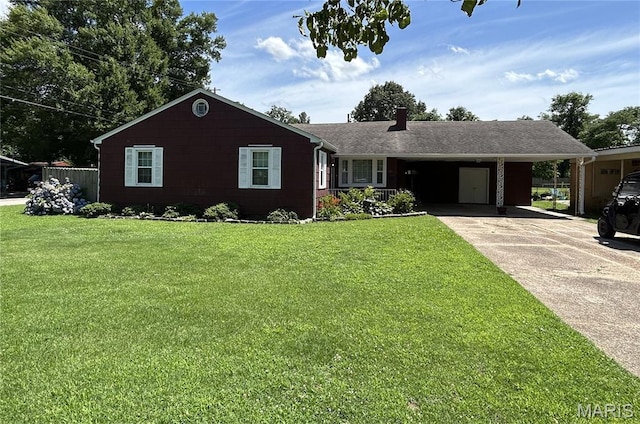 301 W Clipper St, Kennett, MO 63857 - ranch-style house with driveway, an attached carport, and a front yard