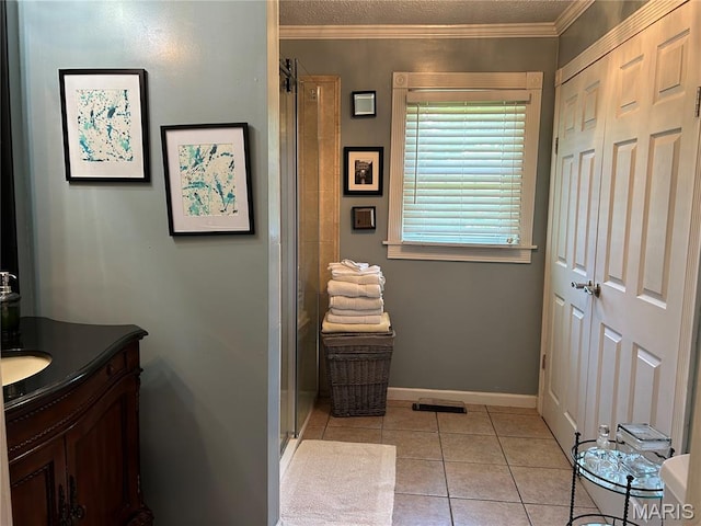 301 W Clipper St, Kennett, MO 63857 - full bath featuring a stall shower, vanity, crown molding, and tile patterned flooring