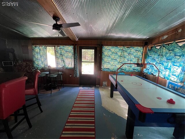 171 Bluffview Cir, Piedmont, MO 63957 - recreation room featuring ceiling fan, wood walls, and concrete floors