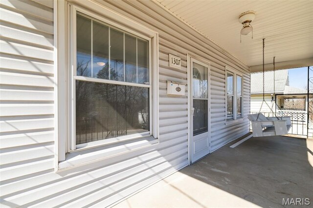 1307 Weleba Ave, Saint Louis, MO 63121 - doorway to property featuring a porch