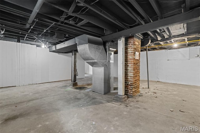 1307 Weleba Ave, Saint Louis, MO 63121 - unfinished basement featuring heating unit