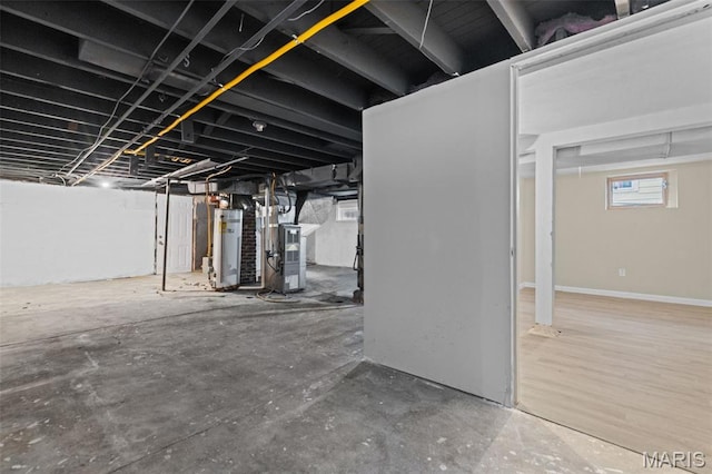 1307 Weleba Ave, Saint Louis, MO 63121 - below grade area featuring gas water heater and heating unit