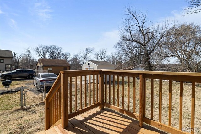 1307 Weleba Ave, Saint Louis, MO 63121 - deck featuring an outbuilding and a gate