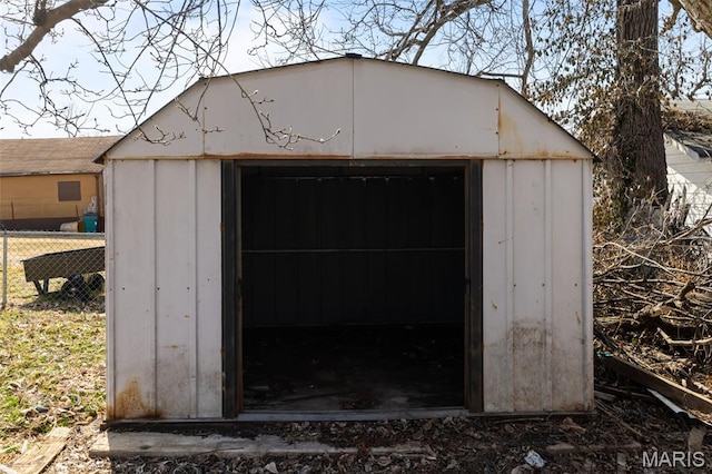 1307 Weleba Ave, Saint Louis, MO 63121 - garage featuring a shed