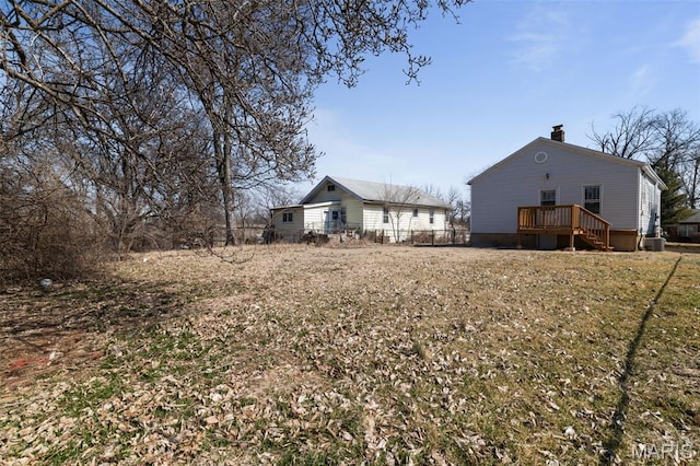 1307 Weleba Ave, Saint Louis, MO 63121 - view of yard with a wooden deck