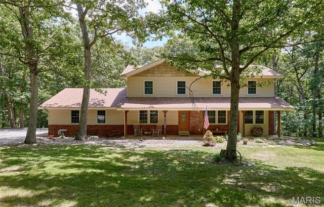 271 Westwood Trl, Foristell, MO 63348 - traditional home featuring brick siding and a front lawn