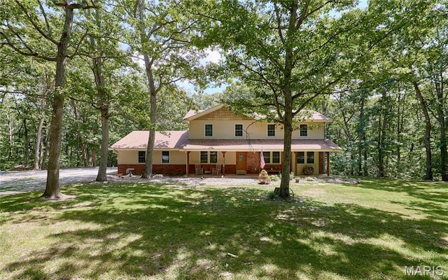 271 Westwood Trl, Foristell, MO 63348 - back of property with a lawn and brick siding