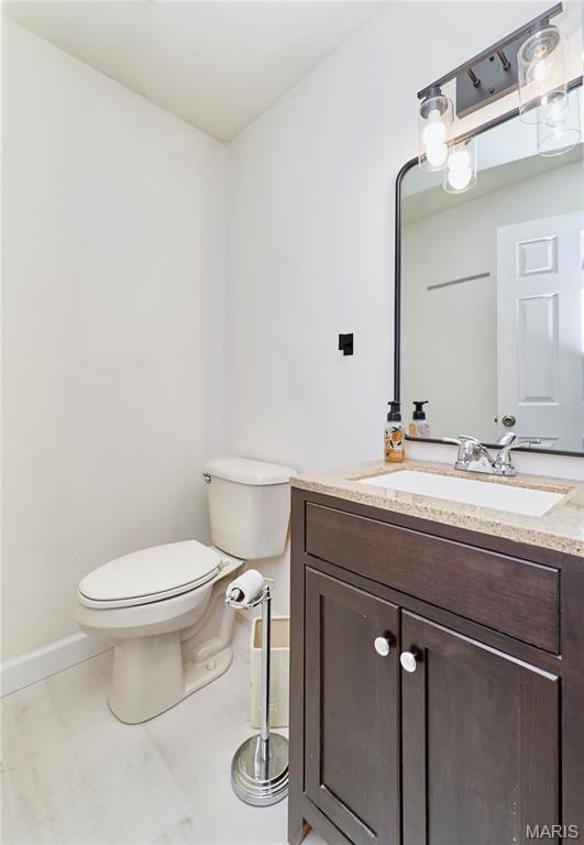 271 Westwood Trl, Foristell, MO 63348 - half bathroom featuring vanity and toilet