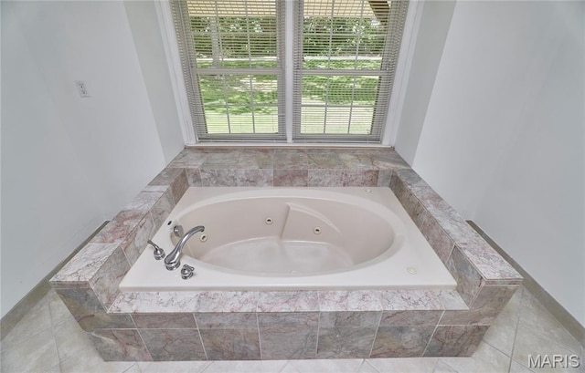 271 Westwood Trl, Foristell, MO 63348 - bathroom featuring a tub with jets and tile patterned flooring