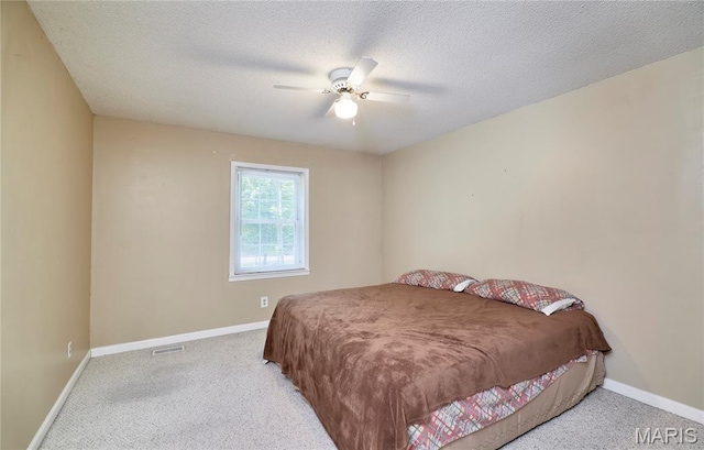 271 Westwood Trl, Foristell, MO 63348 - bedroom featuring light carpet, ceiling fan, and a textured ceiling