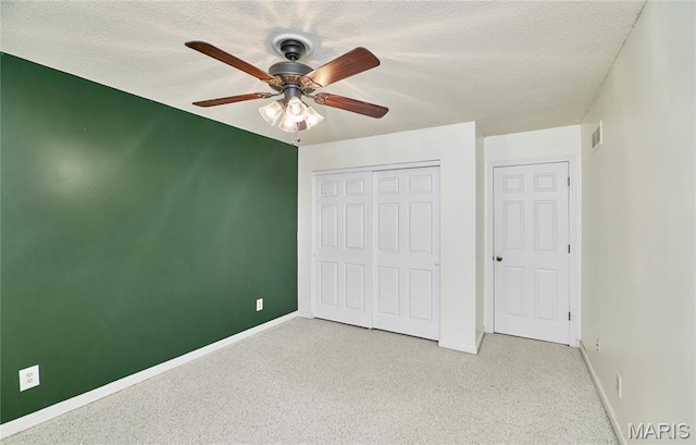 271 Westwood Trl, Foristell, MO 63348 - unfurnished bedroom featuring light carpet, a closet, a textured ceiling, and a ceiling fan