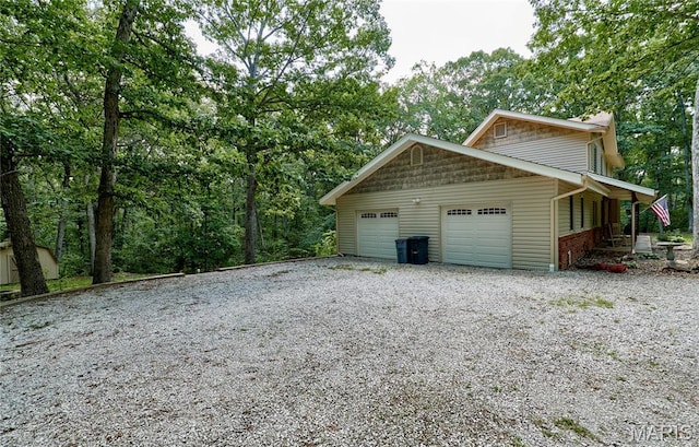271 Westwood Trl, Foristell, MO 63348 - garage featuring driveway