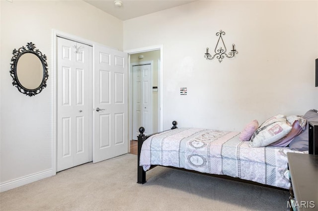 7156 Mardel Ave, Saint Louis, MO 63109 - bedroom featuring light carpet and a closet