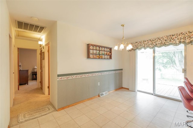 457 Maple Dr, Bethalto, IL 62010 - unfurnished dining area featuring a chandelier