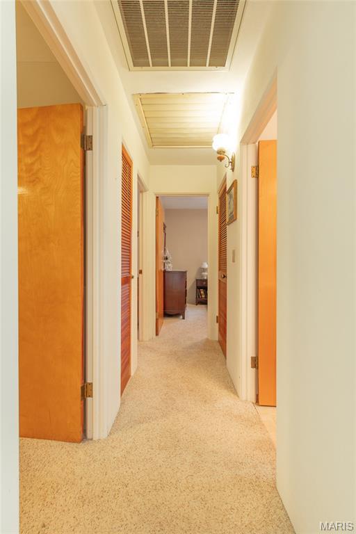 457 Maple Dr, Bethalto, IL 62010 - hallway featuring carpet floors
