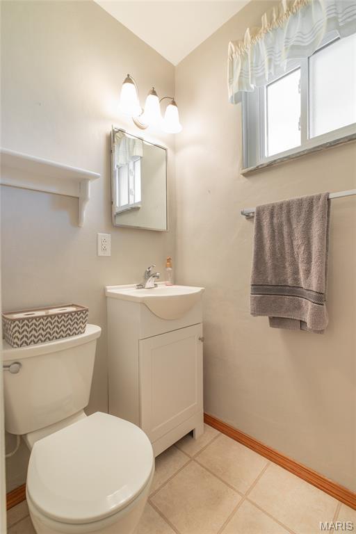 457 Maple Dr, Bethalto, IL 62010 - bathroom with vanity and tile patterned flooring