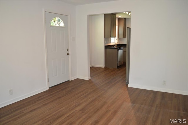 834 Vine St, Festus, MO 63028 - entryway with dark wood finished floors and baseboards