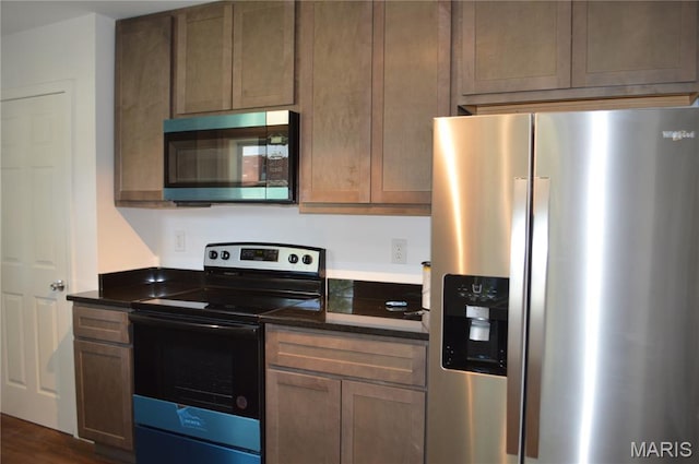 834 Vine St, Festus, MO 63028 - kitchen featuring appliances with stainless steel finishes and dark wood finished floors