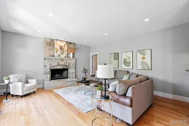 886 Arbor Chase Dr, Wildwood, MO 63021 - living room with wood finished floors, a fireplace, and recessed lighting
