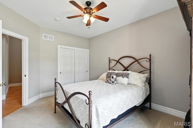 886 Arbor Chase Dr, Wildwood, MO 63021 - bedroom with light carpet, a closet, and a ceiling fan