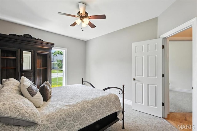 886 Arbor Chase Dr, Wildwood, MO 63021 - carpeted bedroom with baseboards and a ceiling fan