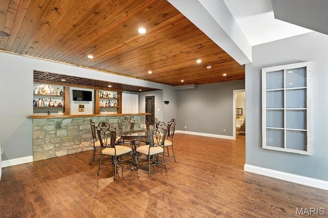 886 Arbor Chase Dr, Wildwood, MO 63021 - dining area featuring wood ceiling, wood finished floors, bar area, recessed lighting, and built in features