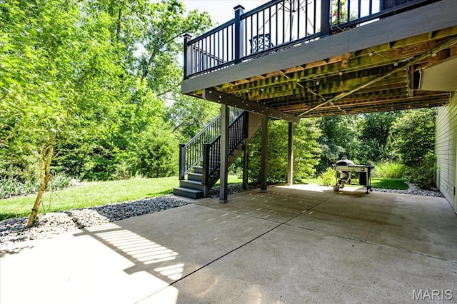 886 Arbor Chase Dr, Wildwood, MO 63021 - view of patio featuring stairs, a deck, driveway, and a carport