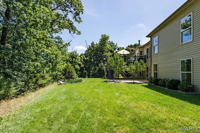 886 Arbor Chase Dr, Wildwood, MO 63021 - view of green lawn featuring a patio and a wooden deck