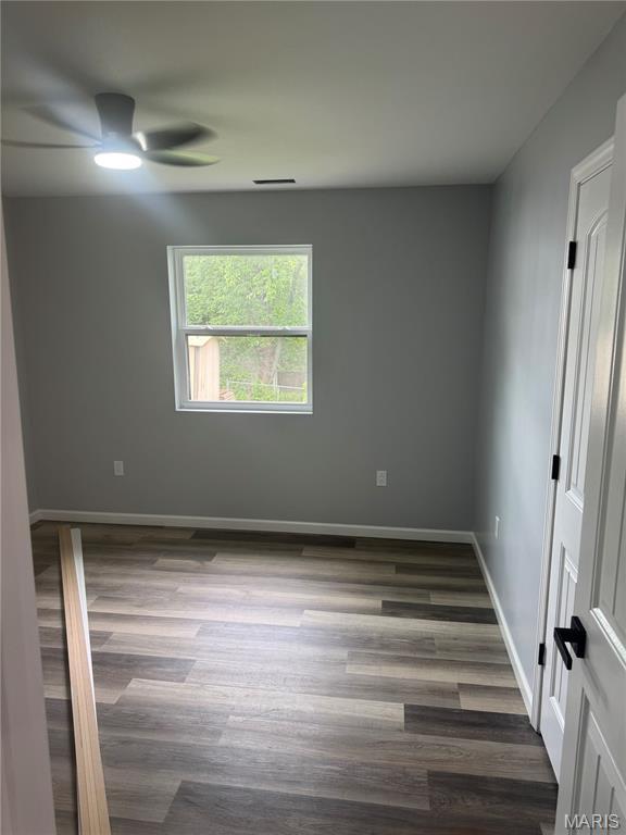 420 Evans Row, Park Hills, MO 63601 - spare room featuring a ceiling fan and dark wood-style flooring