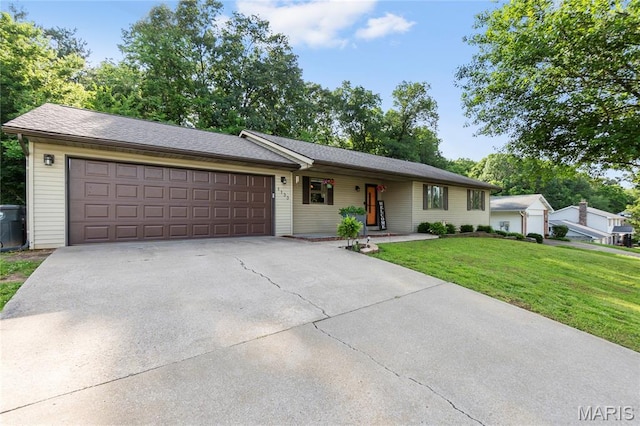 1133 Cypress Ct, Cape Girardeau, MO 63701 - ranch-style house with driveway, a front lawn, and a garage