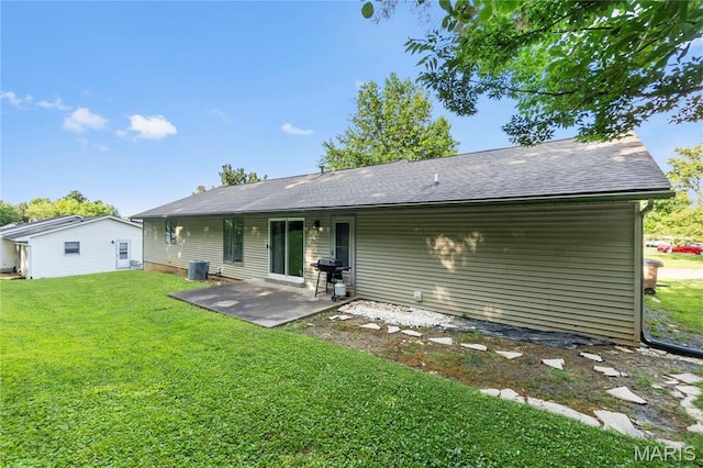 1133 Cypress Ct, Cape Girardeau, MO 63701 - rear view of property featuring a lawn, a patio area, and roof with shingles