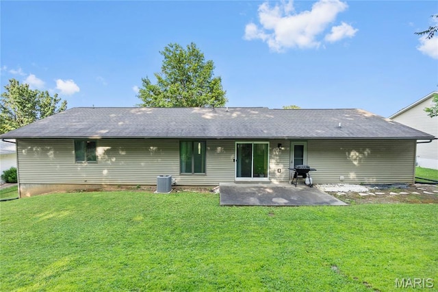 1133 Cypress Ct, Cape Girardeau, MO 63701 - back of property with a patio, a lawn, and a shingled roof