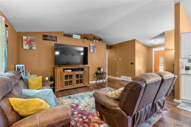 1133 Cypress Ct, Cape Girardeau, MO 63701 - living area featuring lofted ceiling and wood finished floors