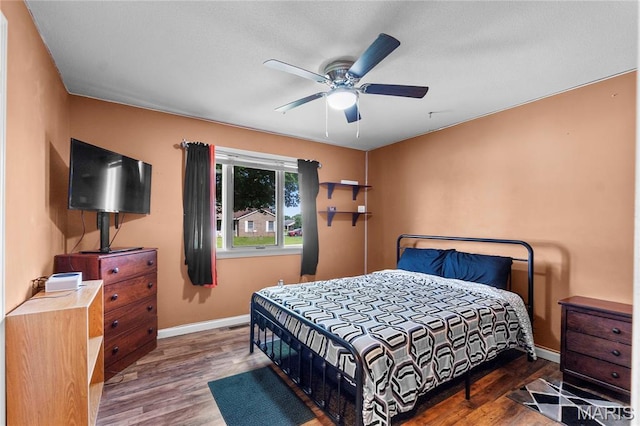 1133 Cypress Ct, Cape Girardeau, MO 63701 - bedroom with wood finished floors and ceiling fan