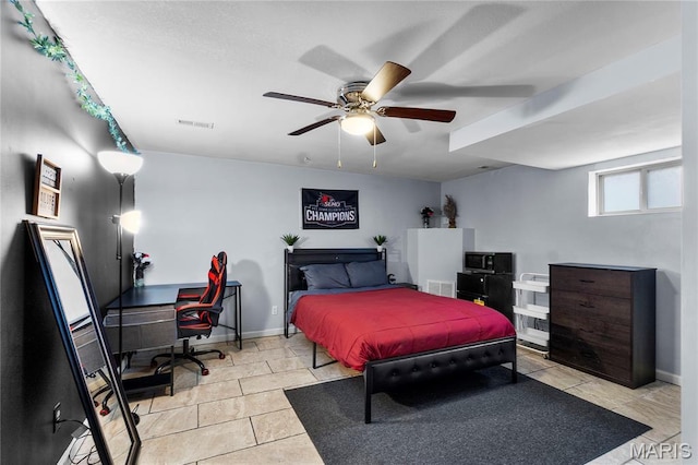 1133 Cypress Ct, Cape Girardeau, MO 63701 - bedroom featuring light tile patterned floors, a desk, and a ceiling fan