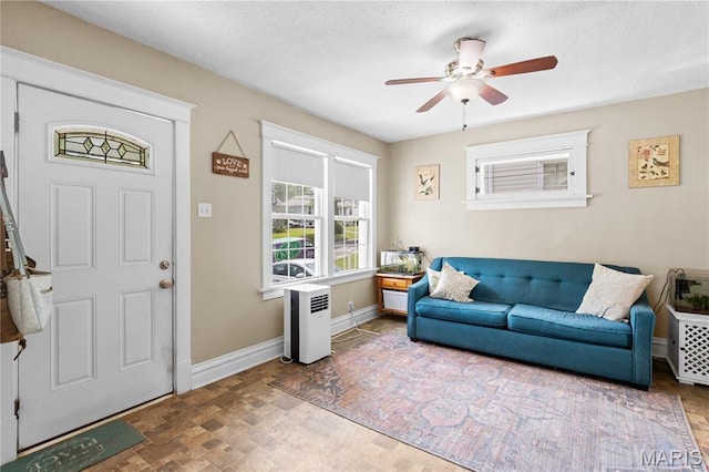 10225 Driver Ave, Overland, MO 63114 - entrance foyer featuring a ceiling fan and baseboards